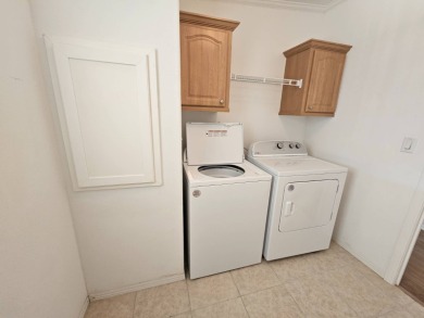 Some pictures have been virtually staged. This home is on leased on Big Cypress Golf and Country Club in Florida - for sale on GolfHomes.com, golf home, golf lot