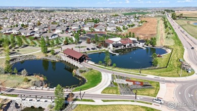 Beautiful ranch-style home backing to greenbelt in Windsor's on Raindance National Golf Course in Colorado - for sale on GolfHomes.com, golf home, golf lot
