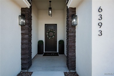 Presenting 6393 S Via De Oro, Fort Mohave, Arizona, a custom on Los Lagos Golf Club in Arizona - for sale on GolfHomes.com, golf home, golf lot
