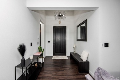 Presenting 6393 S Via De Oro, Fort Mohave, Arizona, a custom on Los Lagos Golf Club in Arizona - for sale on GolfHomes.com, golf home, golf lot