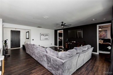 Presenting 6393 S Via De Oro, Fort Mohave, Arizona, a custom on Los Lagos Golf Club in Arizona - for sale on GolfHomes.com, golf home, golf lot