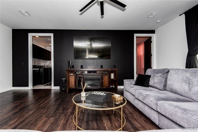 Presenting 6393 S Via De Oro, Fort Mohave, Arizona, a custom on Los Lagos Golf Club in Arizona - for sale on GolfHomes.com, golf home, golf lot