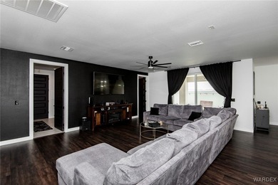 Presenting 6393 S Via De Oro, Fort Mohave, Arizona, a custom on Los Lagos Golf Club in Arizona - for sale on GolfHomes.com, golf home, golf lot