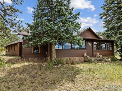 Step inside this charming rustic cabin that offers a peaceful on Estes Park Golf Course in Colorado - for sale on GolfHomes.com, golf home, golf lot