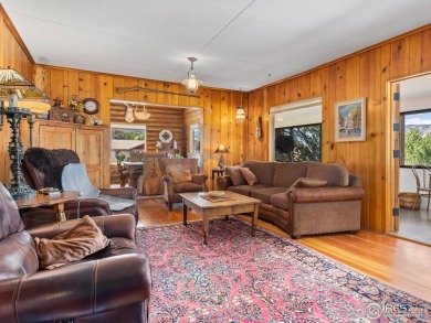 Step inside this charming rustic cabin that offers a peaceful on Estes Park Golf Course in Colorado - for sale on GolfHomes.com, golf home, golf lot