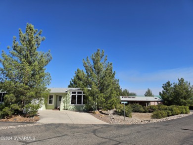 This triple wide 2106 sq ft. manufactured home features 3 on Pine Shadows Golf Course in Arizona - for sale on GolfHomes.com, golf home, golf lot