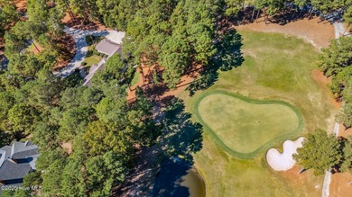 Beautifully positioned on a private, oversized lot near on Pinewild Country Club of Pinehurst in North Carolina - for sale on GolfHomes.com, golf home, golf lot