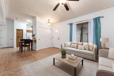 The perfect set up! Beautiful condo with an oversized, 2 car on London Bridge Golf Course in Arizona - for sale on GolfHomes.com, golf home, golf lot