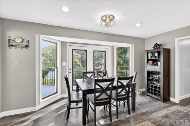 Beautiful 1.5-story waterfront home in the gated lake & golf on Raintree Country Club in Missouri - for sale on GolfHomes.com, golf home, golf lot