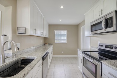 where over $50,000 in major upgrades--including hurricane impact on Cypress Lakes Golf Course - West Palm Beach in Florida - for sale on GolfHomes.com, golf home, golf lot