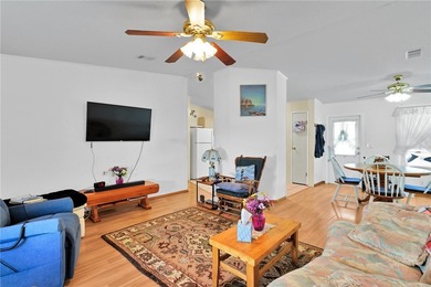 Nice 1993 home for the price in this 55 plus community of Snug on Barefoot Bay Golf Course in Florida - for sale on GolfHomes.com, golf home, golf lot