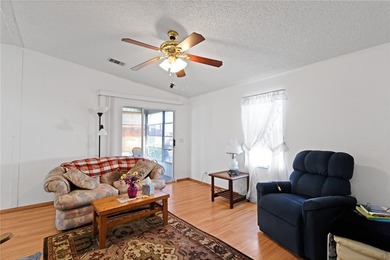 Nice 1993 home for the price in this 55 plus community of Snug on Barefoot Bay Golf Course in Florida - for sale on GolfHomes.com, golf home, golf lot