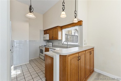 Location! Location! Located in the highly desirable Tan Tar A on The Oaks Golf Course in Missouri - for sale on GolfHomes.com, golf home, golf lot