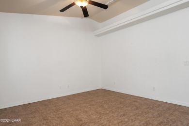 The perfect set up! Beautiful condo with an oversized, 2 car on London Bridge Golf Course in Arizona - for sale on GolfHomes.com, golf home, golf lot