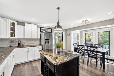Beautiful 1.5-story waterfront home in the gated lake & golf on Raintree Country Club in Missouri - for sale on GolfHomes.com, golf home, golf lot
