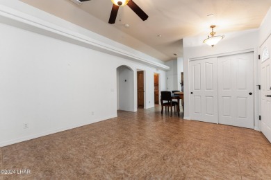 The perfect set up! Beautiful condo with an oversized, 2 car on London Bridge Golf Course in Arizona - for sale on GolfHomes.com, golf home, golf lot