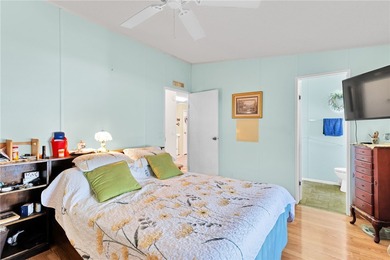 Nice 1993 home for the price in this 55 plus community of Snug on Barefoot Bay Golf Course in Florida - for sale on GolfHomes.com, golf home, golf lot