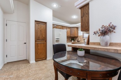 The perfect set up! Beautiful condo with an oversized, 2 car on London Bridge Golf Course in Arizona - for sale on GolfHomes.com, golf home, golf lot