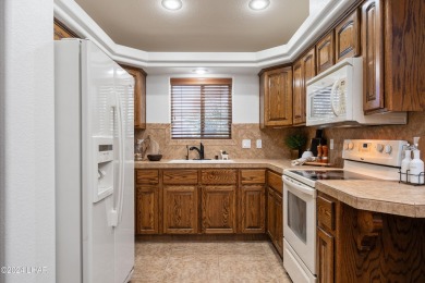 The perfect set up! Beautiful condo with an oversized, 2 car on London Bridge Golf Course in Arizona - for sale on GolfHomes.com, golf home, golf lot