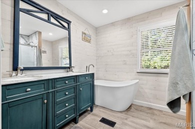 Beautiful 1.5-story waterfront home in the gated lake & golf on Raintree Country Club in Missouri - for sale on GolfHomes.com, golf home, golf lot