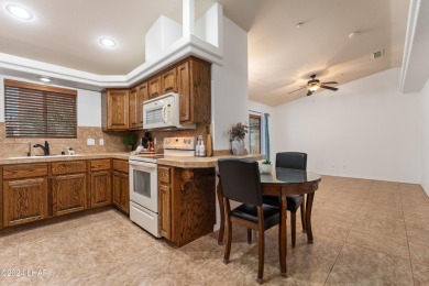 The perfect set up! Beautiful condo with an oversized, 2 car on London Bridge Golf Course in Arizona - for sale on GolfHomes.com, golf home, golf lot