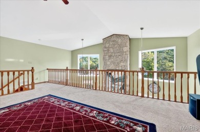Beautiful 1.5-story waterfront home in the gated lake & golf on Raintree Country Club in Missouri - for sale on GolfHomes.com, golf home, golf lot