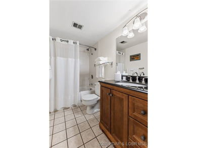 Location! Location! Located in the highly desirable Tan Tar A on The Oaks Golf Course in Missouri - for sale on GolfHomes.com, golf home, golf lot