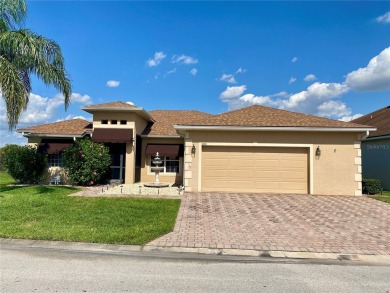THIS POOL HOME IS A RARE FIND WITH VIEWS AND PRIVACY ON THE GOLF on Lake Ashton Golf Club in Florida - for sale on GolfHomes.com, golf home, golf lot