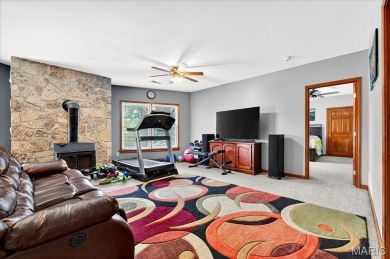 Beautiful 1.5-story waterfront home in the gated lake & golf on Raintree Country Club in Missouri - for sale on GolfHomes.com, golf home, golf lot