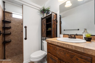 The perfect set up! Beautiful condo with an oversized, 2 car on London Bridge Golf Course in Arizona - for sale on GolfHomes.com, golf home, golf lot