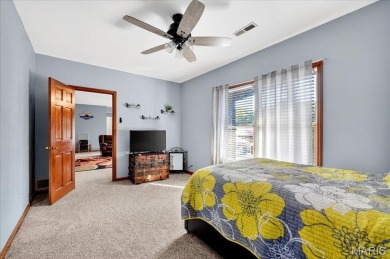 Beautiful 1.5-story waterfront home in the gated lake & golf on Raintree Country Club in Missouri - for sale on GolfHomes.com, golf home, golf lot