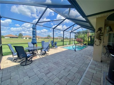 THIS POOL HOME IS A RARE FIND WITH VIEWS AND PRIVACY ON THE GOLF on Lake Ashton Golf Club in Florida - for sale on GolfHomes.com, golf home, golf lot