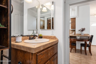The perfect set up! Beautiful condo with an oversized, 2 car on London Bridge Golf Course in Arizona - for sale on GolfHomes.com, golf home, golf lot