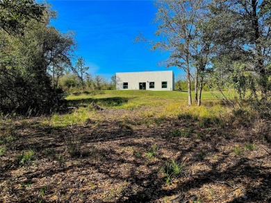 This STUNNING new construction CUSTOM BUILT STEEL MODERN home on Wedgefield Golf Club in Florida - for sale on GolfHomes.com, golf home, golf lot