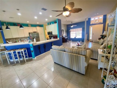 THIS POOL HOME IS A RARE FIND WITH VIEWS AND PRIVACY ON THE GOLF on Lake Ashton Golf Club in Florida - for sale on GolfHomes.com, golf home, golf lot