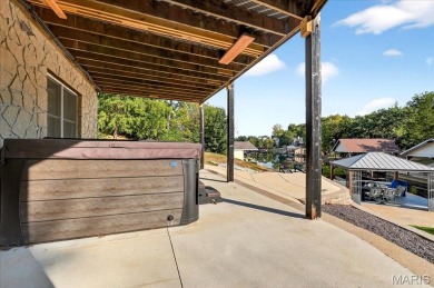 Beautiful 1.5-story waterfront home in the gated lake & golf on Raintree Country Club in Missouri - for sale on GolfHomes.com, golf home, golf lot
