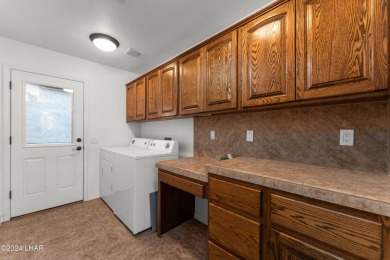 The perfect set up! Beautiful condo with an oversized, 2 car on London Bridge Golf Course in Arizona - for sale on GolfHomes.com, golf home, golf lot