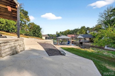 Beautiful 1.5-story waterfront home in the gated lake & golf on Raintree Country Club in Missouri - for sale on GolfHomes.com, golf home, golf lot