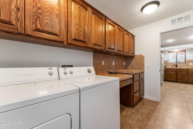 The perfect set up! Beautiful condo with an oversized, 2 car on London Bridge Golf Course in Arizona - for sale on GolfHomes.com, golf home, golf lot