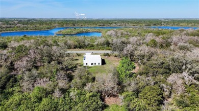 This STUNNING new construction CUSTOM BUILT STEEL MODERN home on Wedgefield Golf Club in Florida - for sale on GolfHomes.com, golf home, golf lot