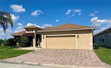THIS POOL HOME IS A RARE FIND WITH VIEWS AND PRIVACY ON THE GOLF on Lake Ashton Golf Club in Florida - for sale on GolfHomes.com, golf home, golf lot