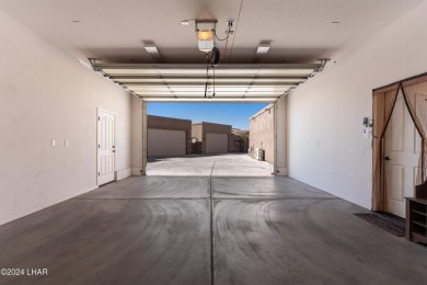 The perfect set up! Beautiful condo with an oversized, 2 car on London Bridge Golf Course in Arizona - for sale on GolfHomes.com, golf home, golf lot