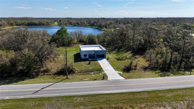 This STUNNING new construction CUSTOM BUILT STEEL MODERN home on Wedgefield Golf Club in Florida - for sale on GolfHomes.com, golf home, golf lot