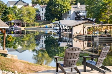 Beautiful 1.5-story waterfront home in the gated lake & golf on Raintree Country Club in Missouri - for sale on GolfHomes.com, golf home, golf lot