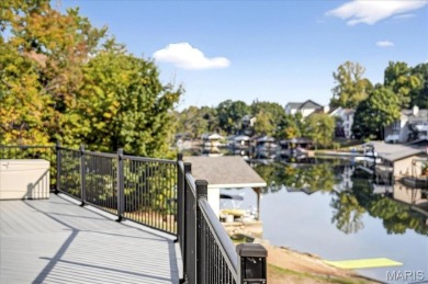 Beautiful 1.5-story waterfront home in the gated lake & golf on Raintree Country Club in Missouri - for sale on GolfHomes.com, golf home, golf lot