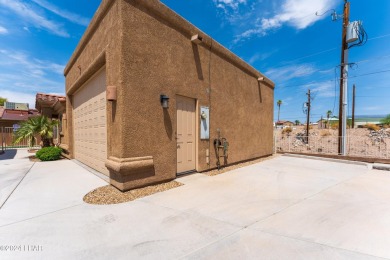 The perfect set up! Beautiful condo with an oversized, 2 car on London Bridge Golf Course in Arizona - for sale on GolfHomes.com, golf home, golf lot