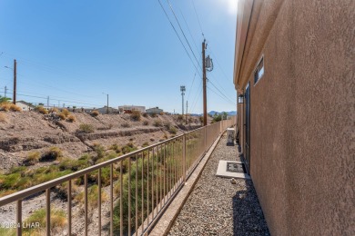The perfect set up! Beautiful condo with an oversized, 2 car on London Bridge Golf Course in Arizona - for sale on GolfHomes.com, golf home, golf lot