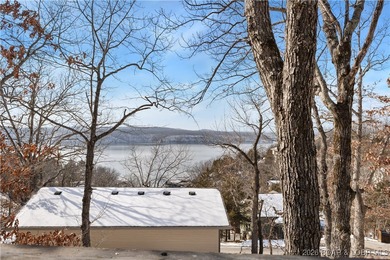 Location! Location! Located in the highly desirable Tan Tar A on The Oaks Golf Course in Missouri - for sale on GolfHomes.com, golf home, golf lot