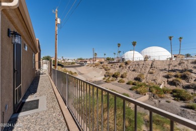 The perfect set up! Beautiful condo with an oversized, 2 car on London Bridge Golf Course in Arizona - for sale on GolfHomes.com, golf home, golf lot