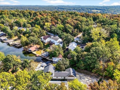 Beautiful 1.5-story waterfront home in the gated lake & golf on Raintree Country Club in Missouri - for sale on GolfHomes.com, golf home, golf lot